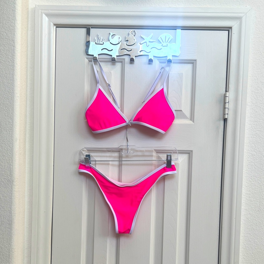PINK WITH WHITE TRIMMING BATHING SUIT. NWOT. M
